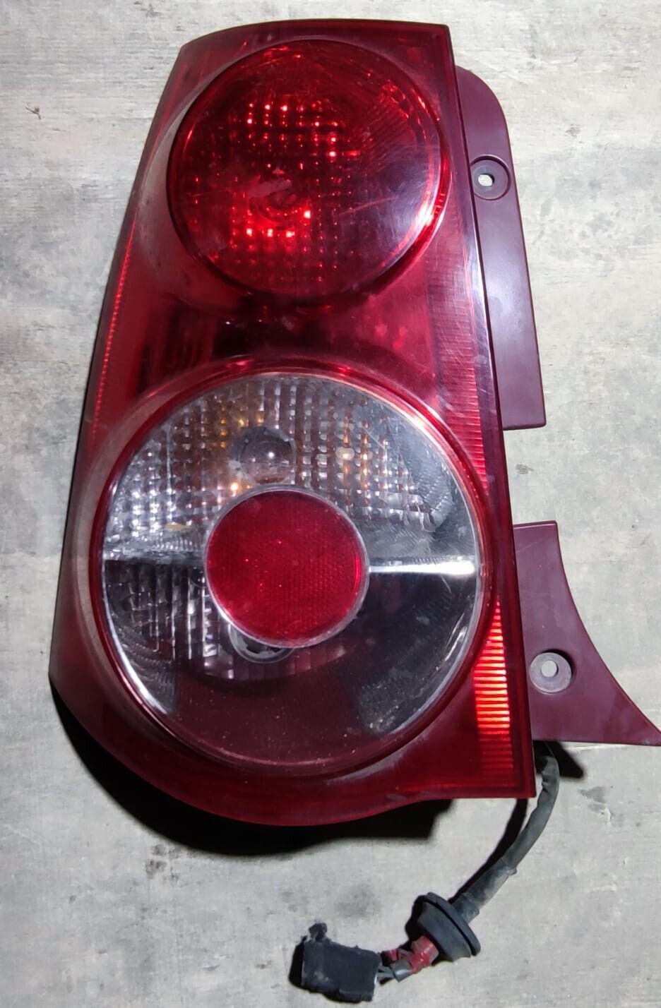 FOCO TRASERO IZQ (DAÑO LEVE) Kia MORNING EX11 2011