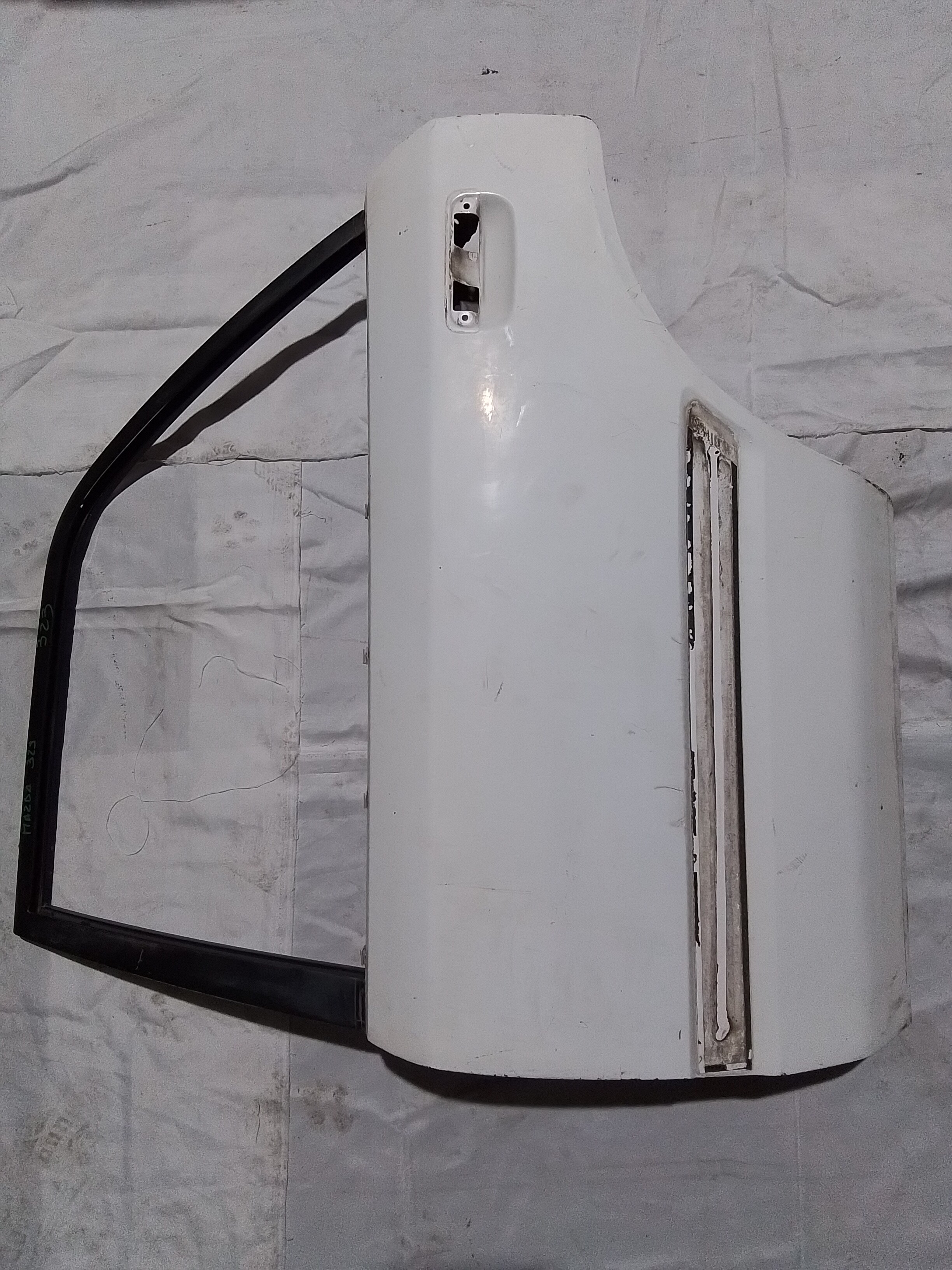 PUERTA TRASERA IZQ Mazda 323 1993
