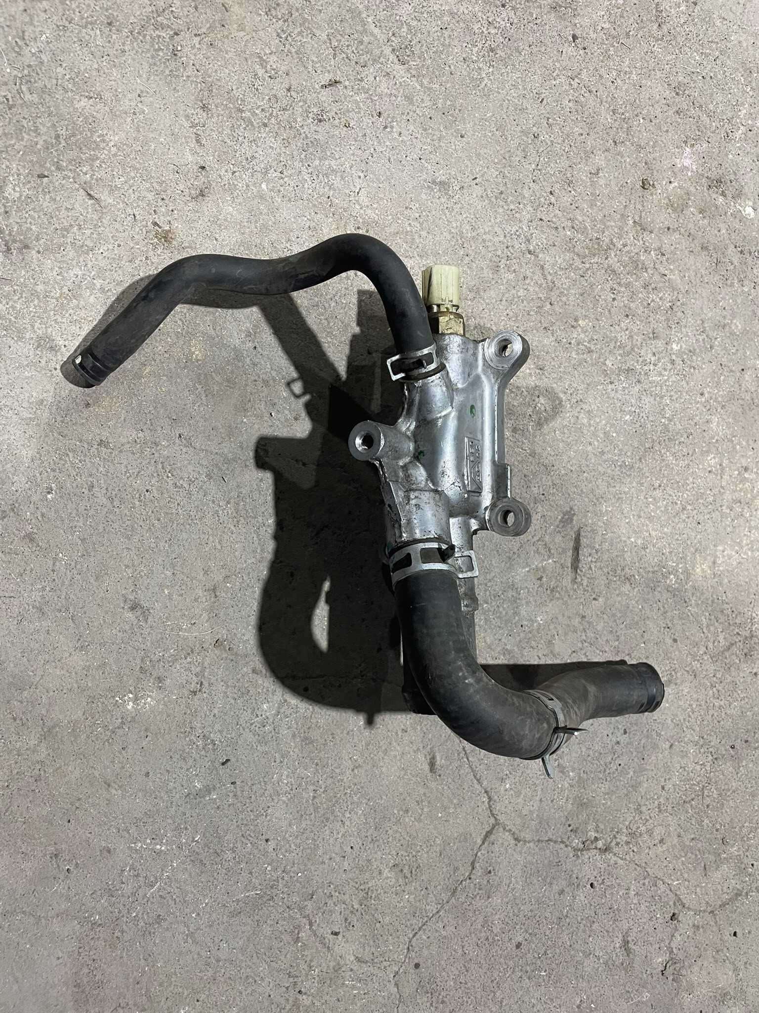 TOMA DE AGUA Honda FIT 2012