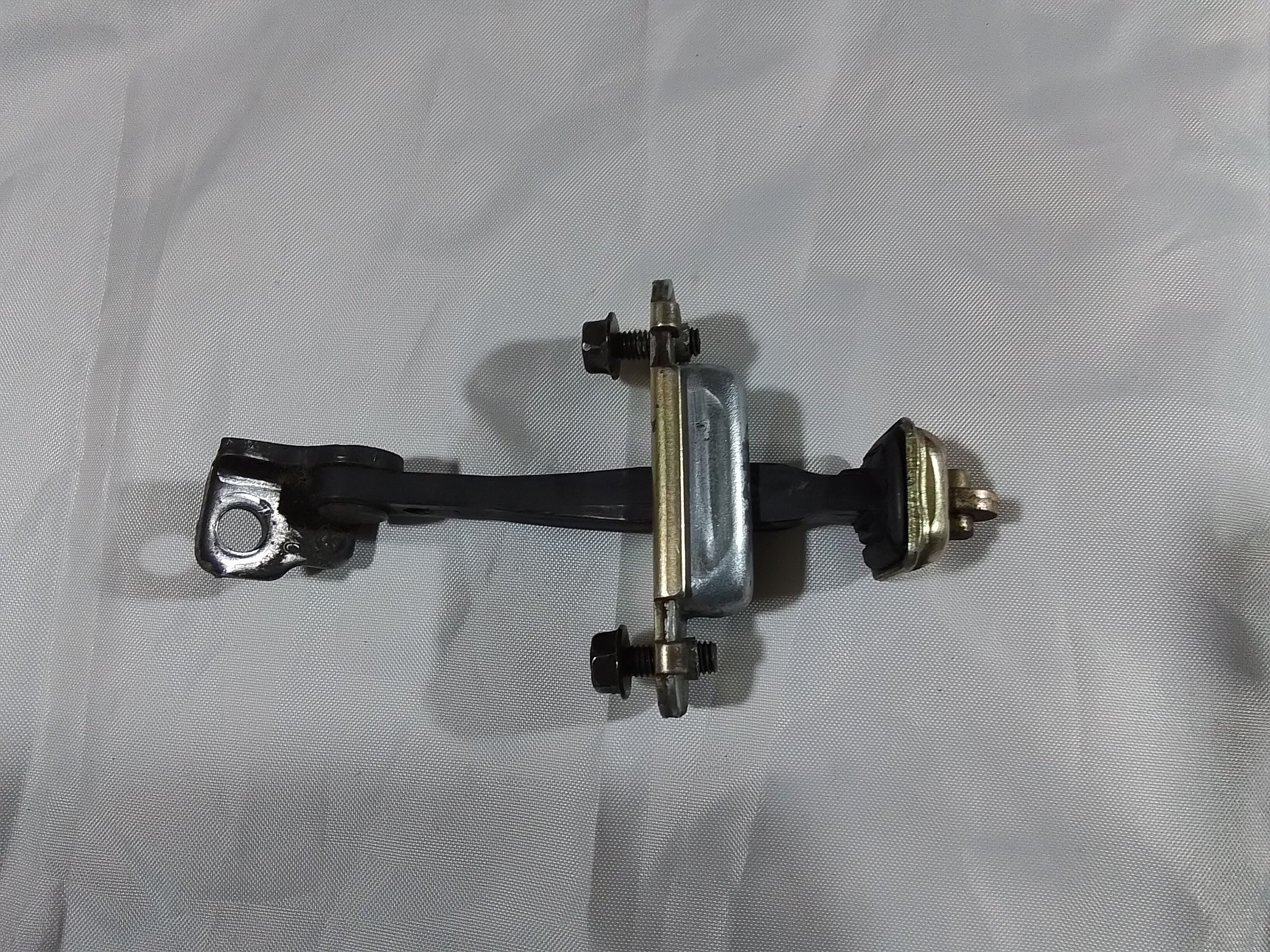 TIRANTE PUERTA DELANTERA IZQ Kia Rio 2003